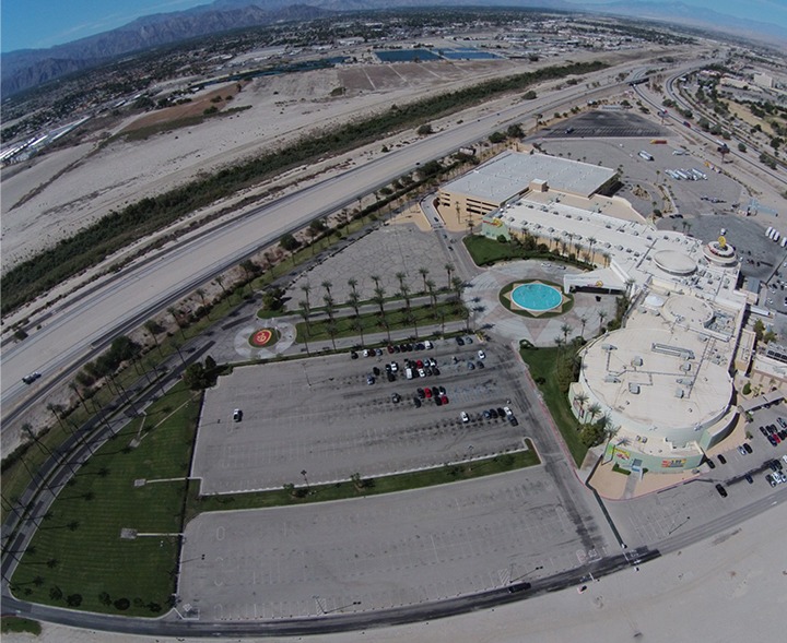Before — worn asphalt parking lot