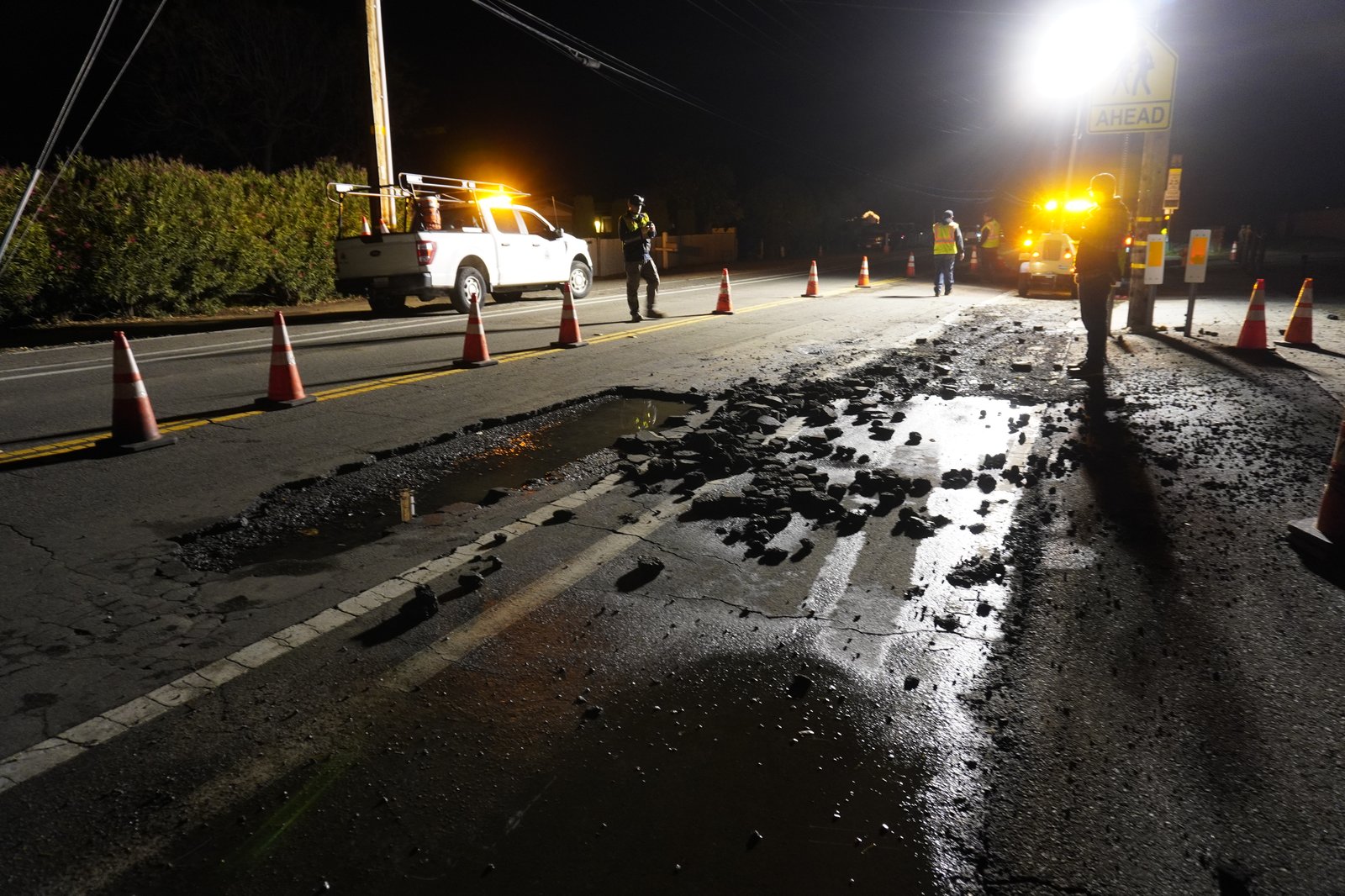 NPG Asphalt crew responding to nighttime emergency pavement failure